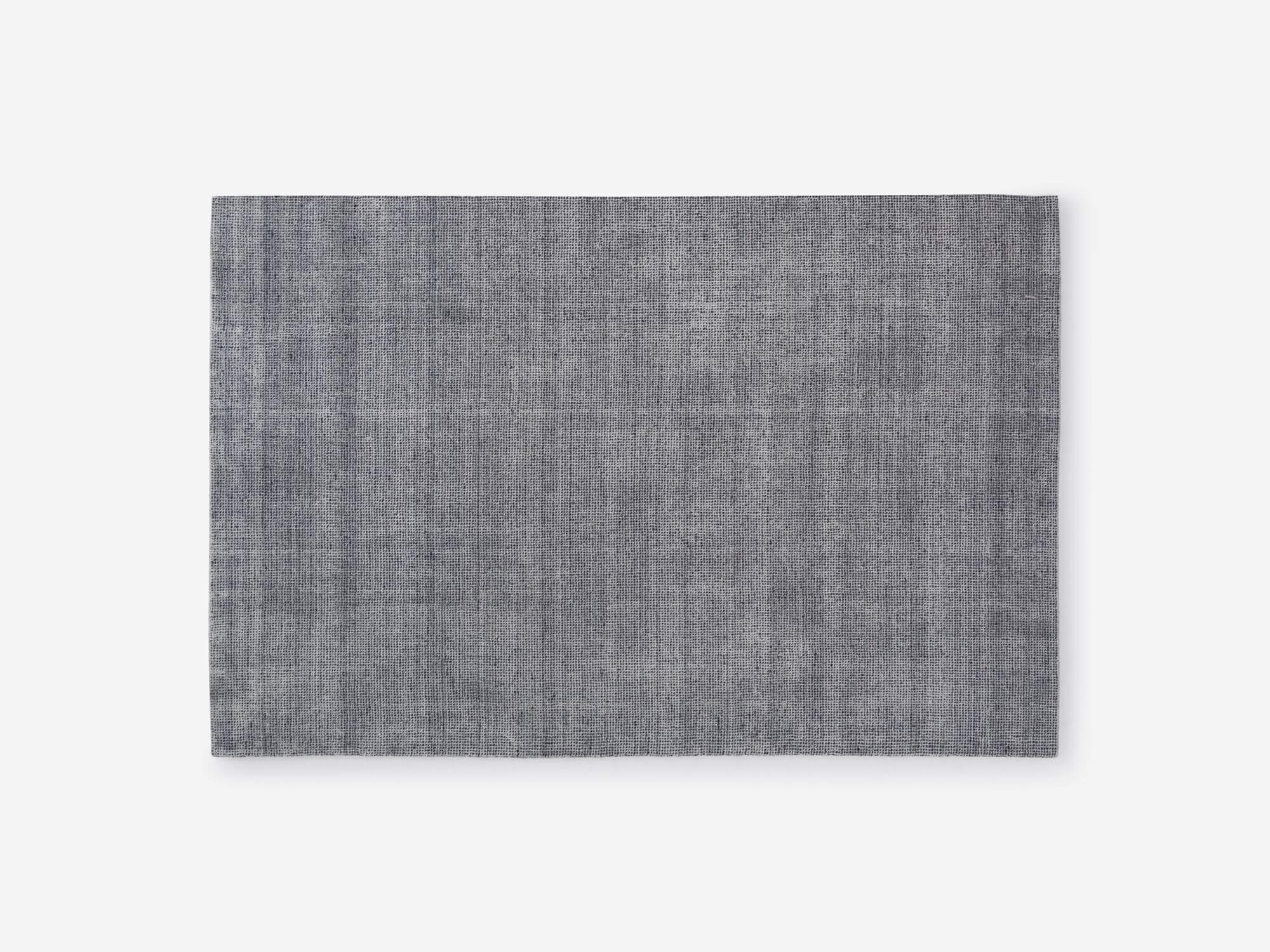 Top view of large grey area rug